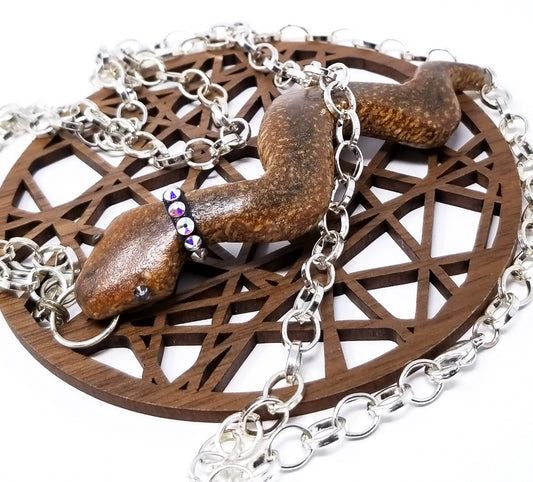 'Nyokabi' Carved Mahogany Snake Pendant Necklace